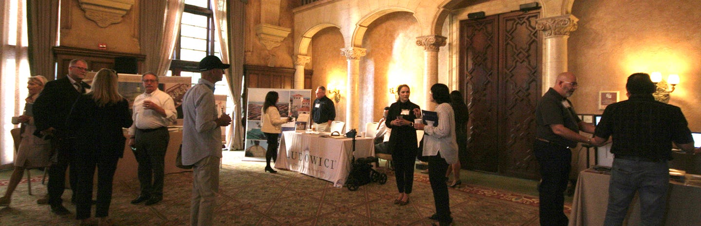 people-visiting-booths-crop.jpg